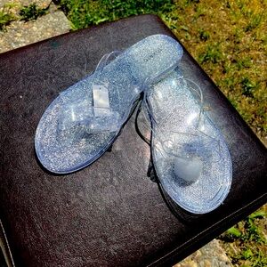 Clear jelly flip flops size 12